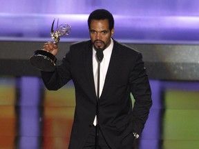 In this June 20, 2008, file photo Kristoff St. John accepts the award for outstanding supporting actor in a drama series for his work on "The Young and the Restless"at the 35th Annual Daytime Emmy Awards in Los Angeles.