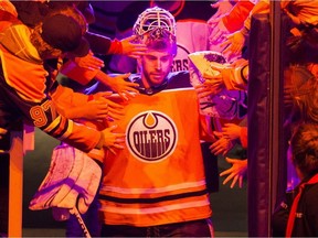 Goalie Cam Talbot is welcomed to the ice by fans as he prepares to take part in the Edmonton Oilers skills competition on Feb. 3, 2018 in Edmonton.
