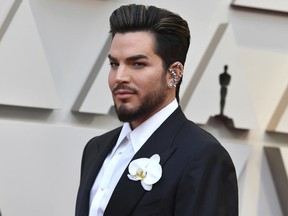 Adam Lambert arrives at the Oscars on Sunday, Feb. 24, 2019, at the Dolby Theatre in Los Angeles. (Photo by Jordan Strauss/Invision/AP)