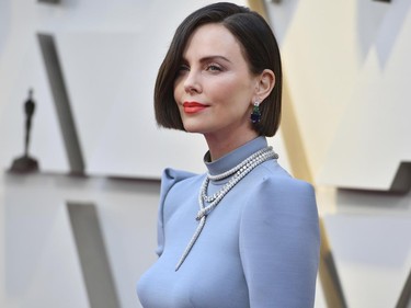 Charlize Theron arrives at the Oscars on Sunday, Feb. 24, 2019, at the Dolby Theatre in Los Angeles. (Jordan Strauss/Invision/AP)