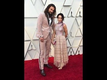 Jason Momoa, left, and Lisa Bonet arrive at the Oscars on Sunday, Feb. 24, 2019, at the Dolby Theatre in Los Angeles. (Jordan Strauss/Invision/AP)