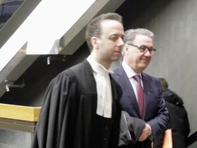 Former SNC chief Pierre Duhaime enters the Montreal courthouse Feb. 1, 2019.