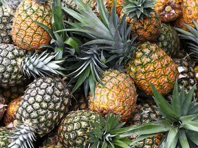 Pineapples are stacked at a plantation in Polomolok, the Philippines, on Thursday, Jan. 26, 2012.