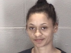 This undated booking photo released by Tippercanoe County Sheriff's Office shows Kiana Champagne Fletcher. The northwestern Indiana woman who barked at a police dog attracted the attention of officers, who arrested her on outstanding warrants. Lafayette police were conducting a traffic stop Monday, Feb. 4, 2019, when 20-year-old Fletcher began barking at a police dog sniffing the car that had been pulled over. Officers recognized Fletcher and knew she had two outstanding warrants. Police reports say Fletcher ran inside her house, but officers arrested her after obtaining a search warrant.