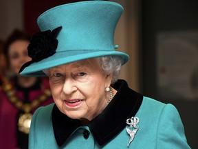 In this Dec. 5, 2018, file photo, Britain's Queen Elizabeth II visits the children's charity, Coram, in London. (Toby Melville /Pool Photo via AP, File)