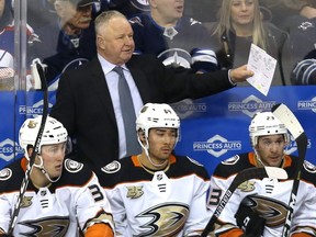Ducks head coach Randy Carlyle makes a point on the bench during NHL action against the Jets in Winnipeg on Jan. 13, 2019.