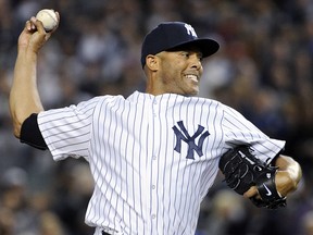 This Sept 26, 2013, file photo shows New York Yankees pitcher Mariano Rivera, pitches against the Tampa Bay Rays in New York. (AP Photo/Bill Kostroun, File)