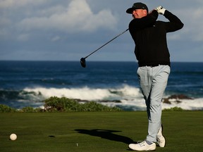 Former NFL player Tony Romo plays his shot from the 13th tee during the third round of the AT&T Pebble Beach Pro-Am at Monterey Peninsula Country Club Shore Course on Feb. 9, 2019 in Pebble Beach, Calif.