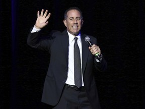 In this Nov. 1, 2016 file photo, Jerry Seinfeld performs at Stand Up For Heroes, at The Theater in New York's Madison Square Garden.