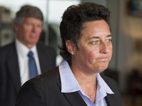Former University of Minnesota Duluth women's hockey coach Shannon Miller attends a news conference about the discrimination lawsuit she and two other female coaches have filed against the school Monday, Sept. 28, 2015. (Richard Tsong-Taatarii/Star Tribune via AP)
