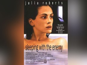 Julia Roberts is pictured in the movie poster for "Sleeping with the Enemy."