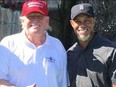 Tiger Woods playing golf with U.S. President-elect Donald Trump.