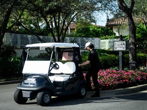 A golf cart with a U.S. flag is seen as President Donald Trump visits the Trump National Golf Club on February 2, 2019, in Jupiter, Florida. (Brendan Smialowski/AFP/Getty Images)