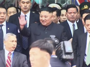 In this image from video, North Korean leader Kim Jong Un waves upon arrival in Dong Dang in Vietnamese border town Tuesday, Feb. 26, 2019, ahead of the second summit with U.S. President Donald Trump. (AP Photo)