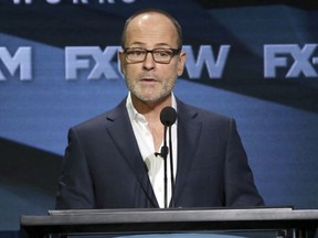 In this Aug. 3, 2018 file photo, John Landgraf, CEO, FX Networks and FX Productions, participates in the executive panel during the FX Television Critics Association Summer Press Tour in Beverly Hills, Calif.