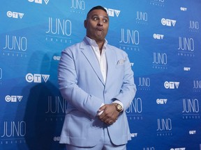 Host Russell Peters poses on the red carpet ahead of the Juno awards show in Ottawa on April 2, 2017.