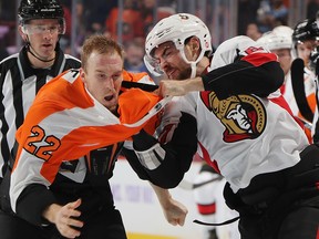 Ben Harpur of the Ottawa Senators fights with Dale Weise of the Philadelphia Flyers at the Wells Fargo Center on November 27, 2018 in Philadelphia. (Bruce Bennett/Getty Images)