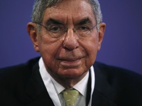 In this Nov. 13, 2015 file photo, Costa Rican 1987 Nobel peace laureate and former president of Costa Rica, Oscar Arias, looks at the media during the opening ceremony of the XV World Summit of Nobel Peace Laureates at the University in Barcelona, Spain.