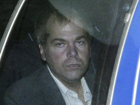 In this Nov. 18, 2003, file photo, John Hinckley Jr. arrives at U.S. District Court in Washington. Hinckley, who tried to assassinate President Ronald Reagan, told doctors in 2018 that he’s never been happier. (AP Photo/Evan Vucci, File)