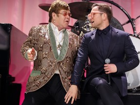 Elton John and Taron Egerton perform onstage during the 27th annual Elton John AIDS Foundation Academy Awards Viewing Party sponsored by IMDb and Neuro Drinks celebrating EJAF and the 91st Academy Awards on Feb. 24, 2019 in West Hollywood, Calif. (Rich Fury/Getty Images for EJAF)