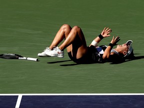 Canada's Bianca Andreescu celebrates match point against Angelique Kerber of Germany during the women's final of the BNP Paribas Open at the Indian Wells Tennis Garden on March 17, 2019 in Indian Wells, California. (Photo by Matthew Stockman/Getty Images)