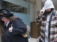 Victoria Small and her son, Jason, leave a Newmarket court after pleading guilty to permitting animals to be in distress (Stan Behal, Toronto Sun)