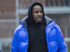 R. Kelly walks out of Cook County Jail after posting $100,000 bail, in Chicago on Feb. 25, 2019.