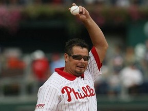 Former Phillies pitcher, Mitch Williams throws out the ceremonial first pitch prior to the game between the Milwaukee Brewers and the Philadelphia Phillies during Game 1 of the NLDS Playoffs at Citizens Bank Ballpark on October 1, 2008 in Philadelphia, Pennsylvania.