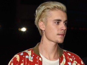 In this file photo taken on February 10, 2016,  Justin Bieber attends the Yves Saint Laurent men's fall line and the first part of its women's collection fashion show at the Paladium, in Hollywood, California.