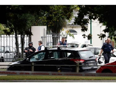 Police officers are seen at the Masjid al Noor mosque after a shooting incident in Christchurch on March 15, 2019.