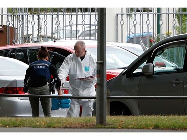 A forensic official works at the Masjid al Noor mosque after a shooting incident in Christchurch on March 15, 2019.