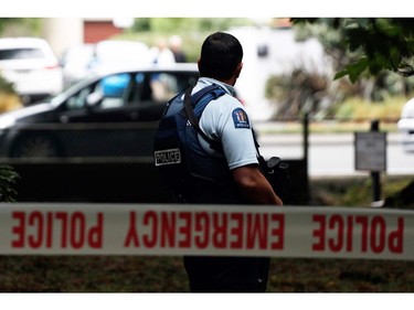 A police officer secures the area in front of the Masjid al Noor mosque after a shooting incident in Christchurch on March 15, 2019.