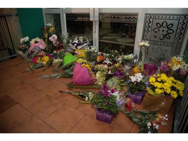 Flowers are placed on the front steps of the Wellington Masjid mosque in Kilbirnie in Wellington on March 15, 2019, after a shooting incident at two mosques in Christchurch.