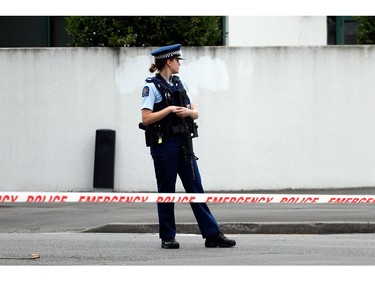 A police officer secures the area in front of the Masjid al Noor mosque after a shooting incident in Christchurch on March 15, 2019.