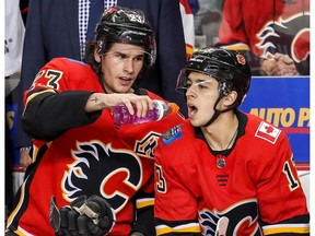 The Calgary Flames' Johnny Gaudreau celebrates with teammate Sean Monahan after scoring against the New Jersey Devils in NHL hockey at the Scotiabank Saddledome in Calgary on Tuesday. Photo by Al Charest/Postmedia.