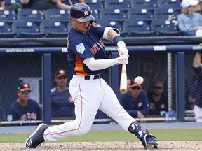 Alex Bregman of the Houston Astros hits the ball against the Miami Marlins during a spring training game at The Fitteam Ballpark of the Palm Beaches on March 14, 2019 in West Palm Beach, Florida. (Joel Auerbach/Getty Images)