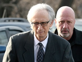 Dr. Johnnie Barto heads into Cambria County Courthouse, in Ebensburg, Pa., on Monday, March 18, 2019, for his sentencing in the sexual assault of over two dozen children.