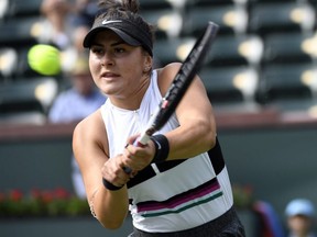 Bianca Andreescu hits a backhand against Irina-Camelia Begu during their ladies singles first round match at the BNP Paribas Open in Indian Wells, Calif., on March 6, 2019.