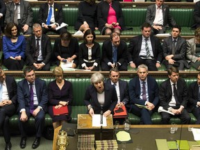 Britain's Prime Minister Theresa May speaks to lawmakers in the House of Commons, London, Wednesday March 13, 2019.