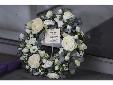 A wreath layed by Britain's leader of the opposition Labour Party Jeremy Corbyn at New Zealand House in London, Friday, March 15, 2019.