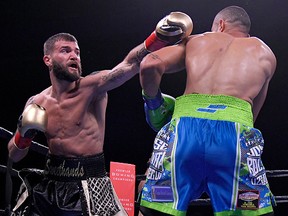Caleb Plant (left) and Jose Uzcategui battle in their IBF Super Middleweight Championship match at Microsoft Theater on January 13, 2019 in Los Angeles. (John McCoy/Getty Images)