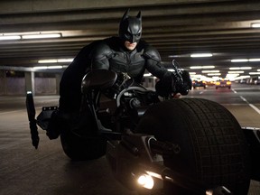This undated film image released by Warner Bros. Pictures shows Christian Bale as Batman in a scene from the action thriller "The Dark Knight Rises." (AP Photo/Warner Bros. Pictures, Ron Phillips)