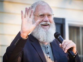 In this Thursday, Sept. 27, 2018 file photo, former Late Night talk show host David Letterman waves during a political rally in Muncie, Ind.