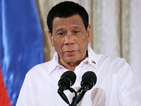 In this Oct. 9, 2018, file photo, Philippine President Rodrigo Duterte addresses congressmen and Government officials during the presentation of Republic Act bills in a ceremony at the Presidential Palace in Manila, Philippines. (AP Photo/Bullit Marquez, File)