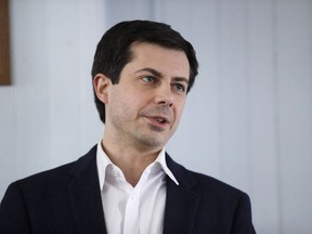 In this Feb. 16, 2019, photo, Indiana's Sound Bend Mayor Pete Buttigieg speaks during a stop in Raymond, N.H. Democratic presidential hopeful Buttigieg said Sunday, March 10, that he and Vice President Mike Pence have different views of their Christian faith and that he doesn't understand Pence's loyalty to President Donald Trump.