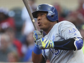 In this Tuesday, July 10, 2018 file photo, Kansas City Royals' Salvador Perez bats against the Minnesota Twins in the first inning of a baseball game in Minneapolis. (AP Photo/Jim Mone, File)