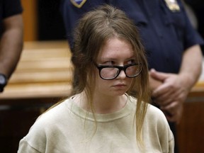 In this Oct. 30, 2018 file photo, Anna Sorokin appears in New York State Supreme Court on grand larceny charges. On Wednesday, March 27, 2019, Sorokin, the one-time darling of the Big Apple social scene is scheduled to stand trial on grand larceny and theft of services charges alleging she swindled $275,000 in a 10-month odyssey that saw her jetting to Omaha and Marrakesh.