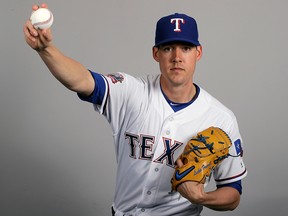 This Wednesday, Feb. 20, 2019 file photo shows Luke Farrell of the Texas Rangers.