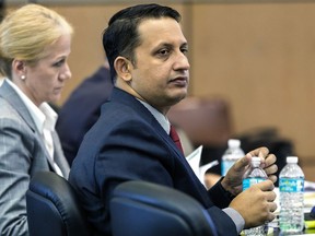 Nouman Raja listens to the testimony of Michael LaForte, a crime reconstruction expert, during his trial Tuesday, March 5, 2019 in West Palm Beach, Fla.