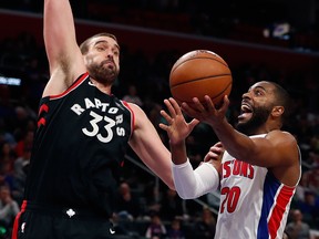Detroit Pistons guard Wayne Ellington attempts a layup as Toronto Raptors centre Marc Gasol defends during the second half of an NBA game, Sunday, March 17, 2019, in Detroit.